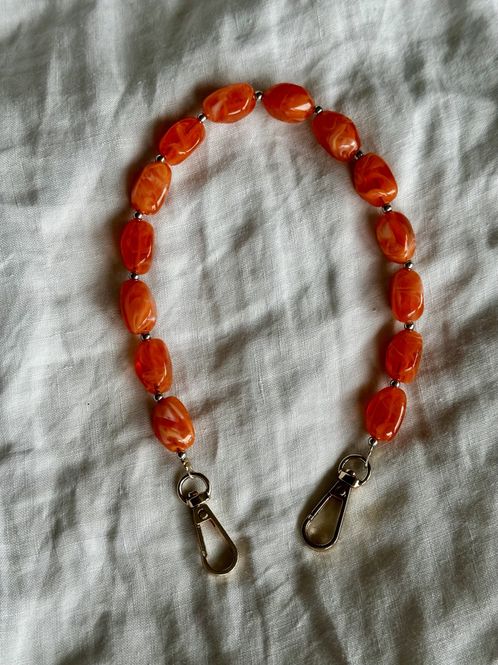 Hovedbilde Tynn perler på en snor - orange